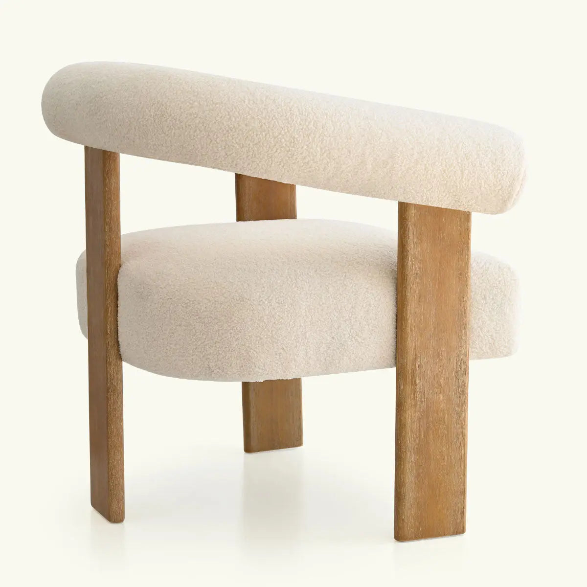 Maye Beige Boucle chair with wooden legs, elegant living room design, boucle upholstery detail.