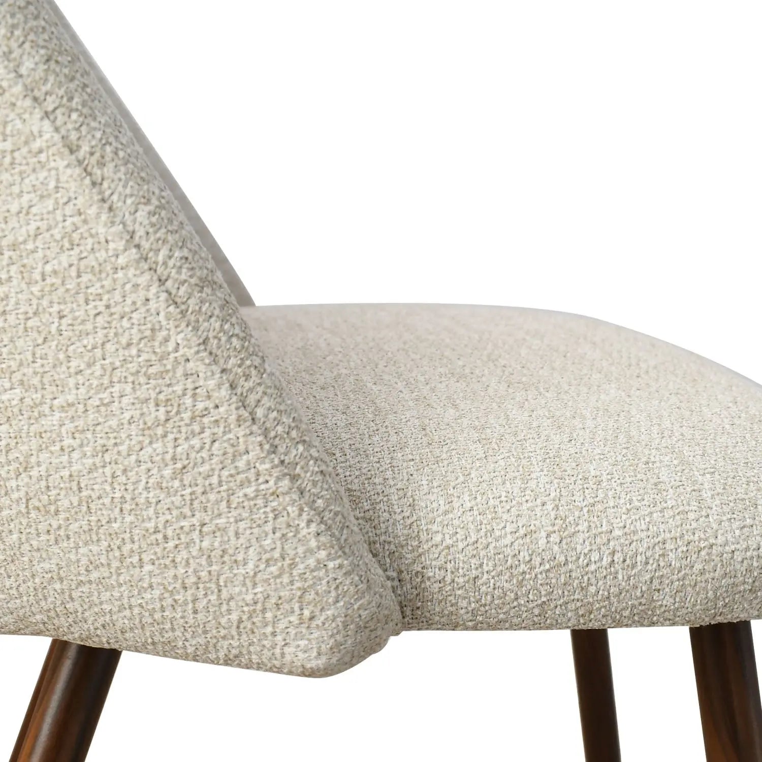 Oliver & Edwin dining chair with beige upholstery, showcasing modern design and wooden legs.