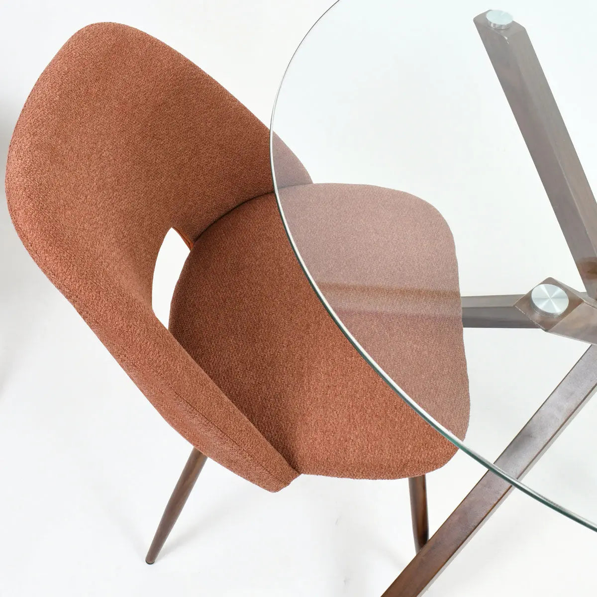 Oliver & Edwin round glass top dining table set with brown fabric chair, modern design.