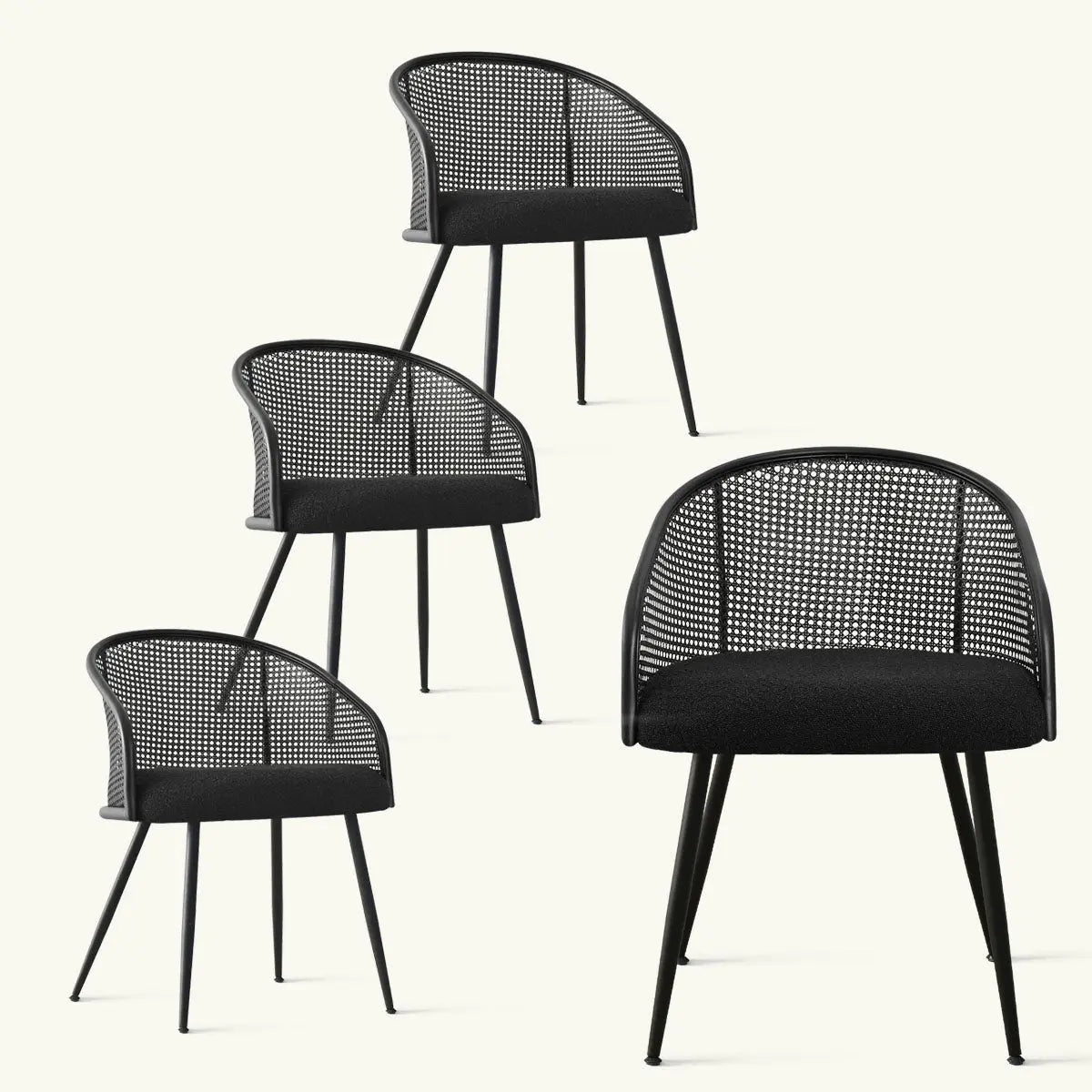 Set of four black upholstered rattan dining chairs with arms, featuring modern metal legs.