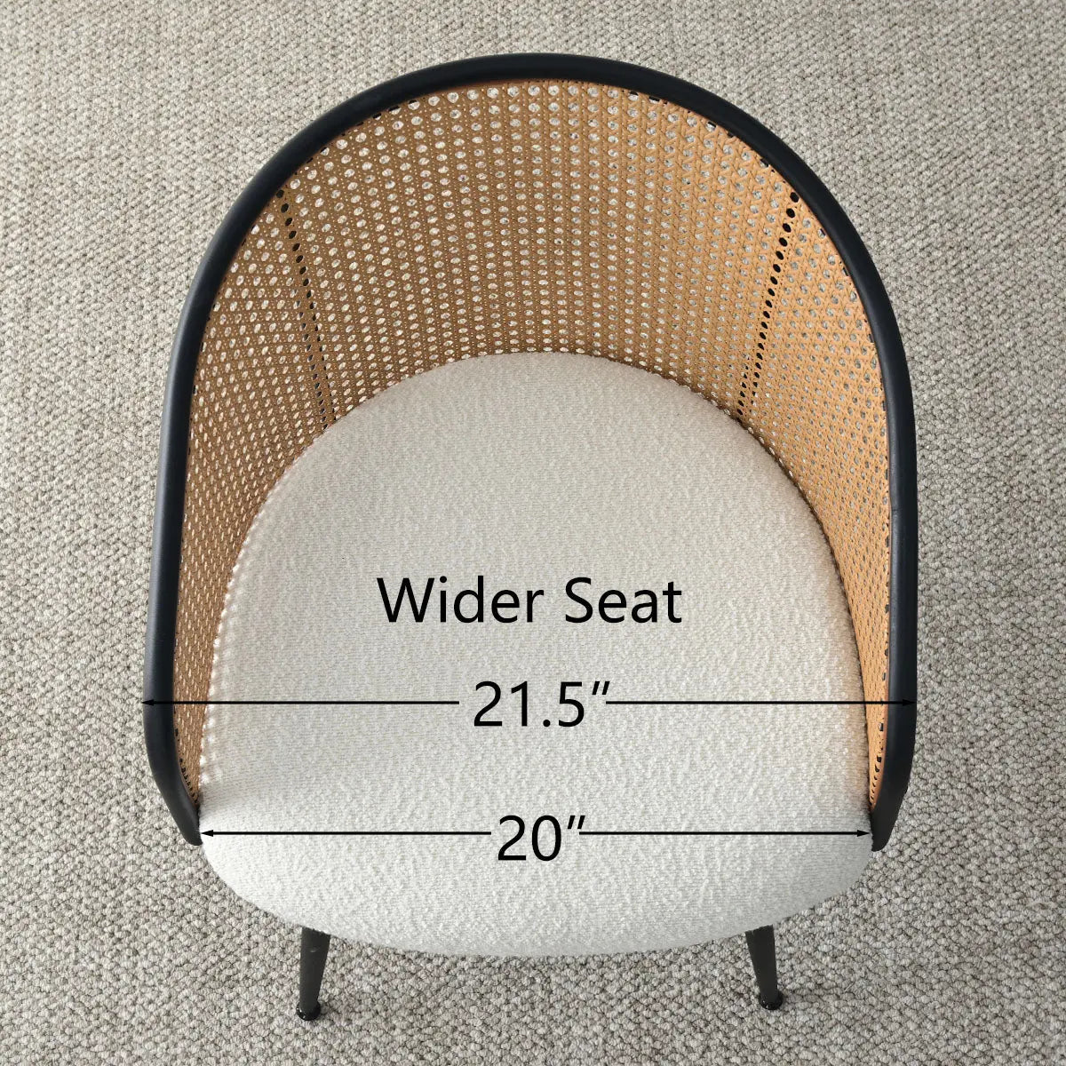 Top view of Jules Modern Upholstered Rattan Dining Chair with Arms, beige textured carpet background.