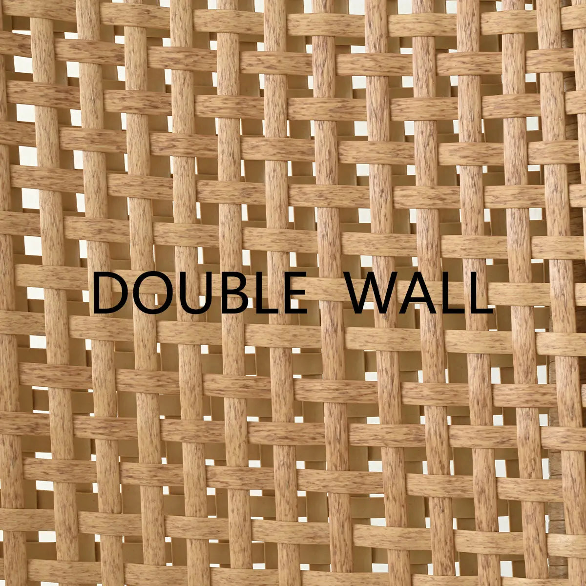 Rattan chair detail with double wall weave pattern, beige and light wood tones, upholstery not visible.