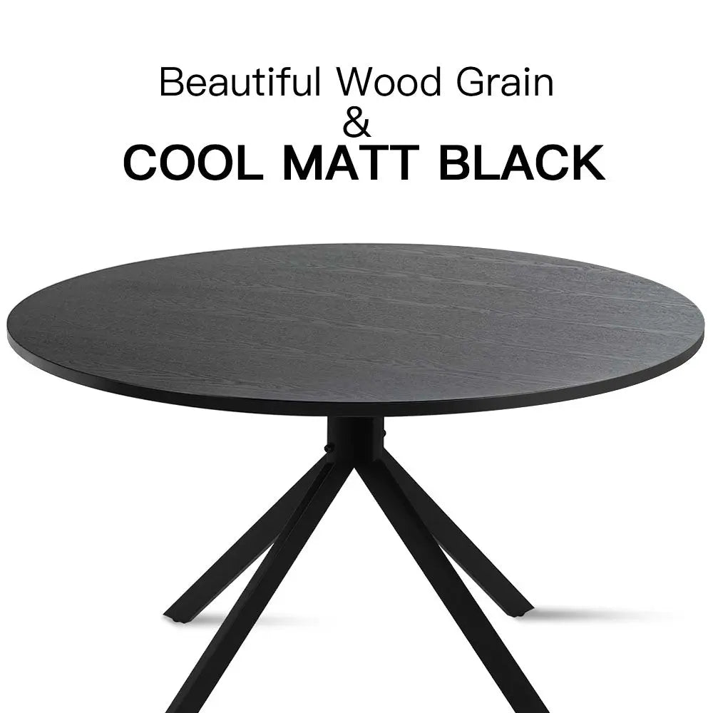 Jones Modern Black Round Dining Table with wood grain.